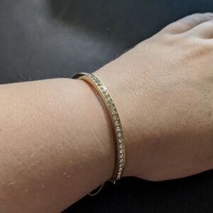 Gold Tone Clear Rhinestone Half Bangle Slide Knot Style Statement Bracelet